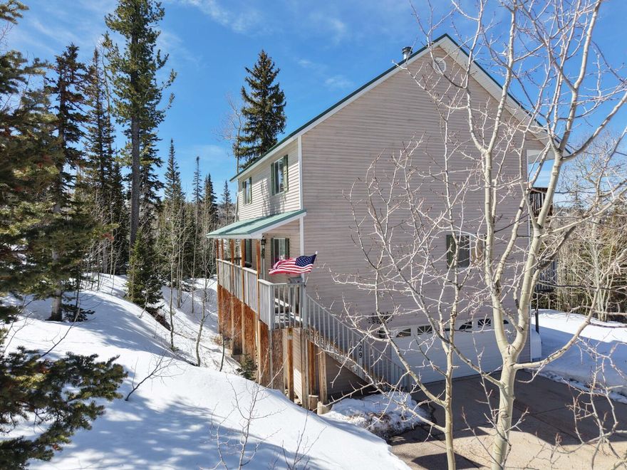 2503 SF on wooded .46 acre with paved year-round access. Full furnished with Ca-King Sleep Number, walk-in shower and large soaking tub in master which also has a deck off the room with fabulous view. Double bunks in upstairs room, queen bedroom with walk-in close on main level. Basement heated storage area. Oversize garage.Located 1 minute from ski resort. Year-round accessible and STR approved.