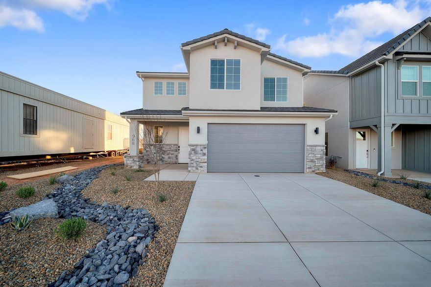 **NO BACKYARD NEIGHBOR** Discover your perfect oasis in this brand-new home, nestled in a delightful community adjacent to the exciting Zion Shores Surf Park and Southern Utah's breathtaking recreational areas. This thoughtfully designed residence seamlessly combines modern elegance with comfortable living, making it ideal for families and outdoor enthusiasts alike. The spacious home features large windows that flood the space with natural light. Step outside to enjoy your private backyard, perfect for barbecues or simply soaking in the stunning Southern Utah views. The community offers outstanding amenities and easy access to Warner Valley and Sand Hollow. Embrace the lifestyle you've always wanted while living in this charming home!