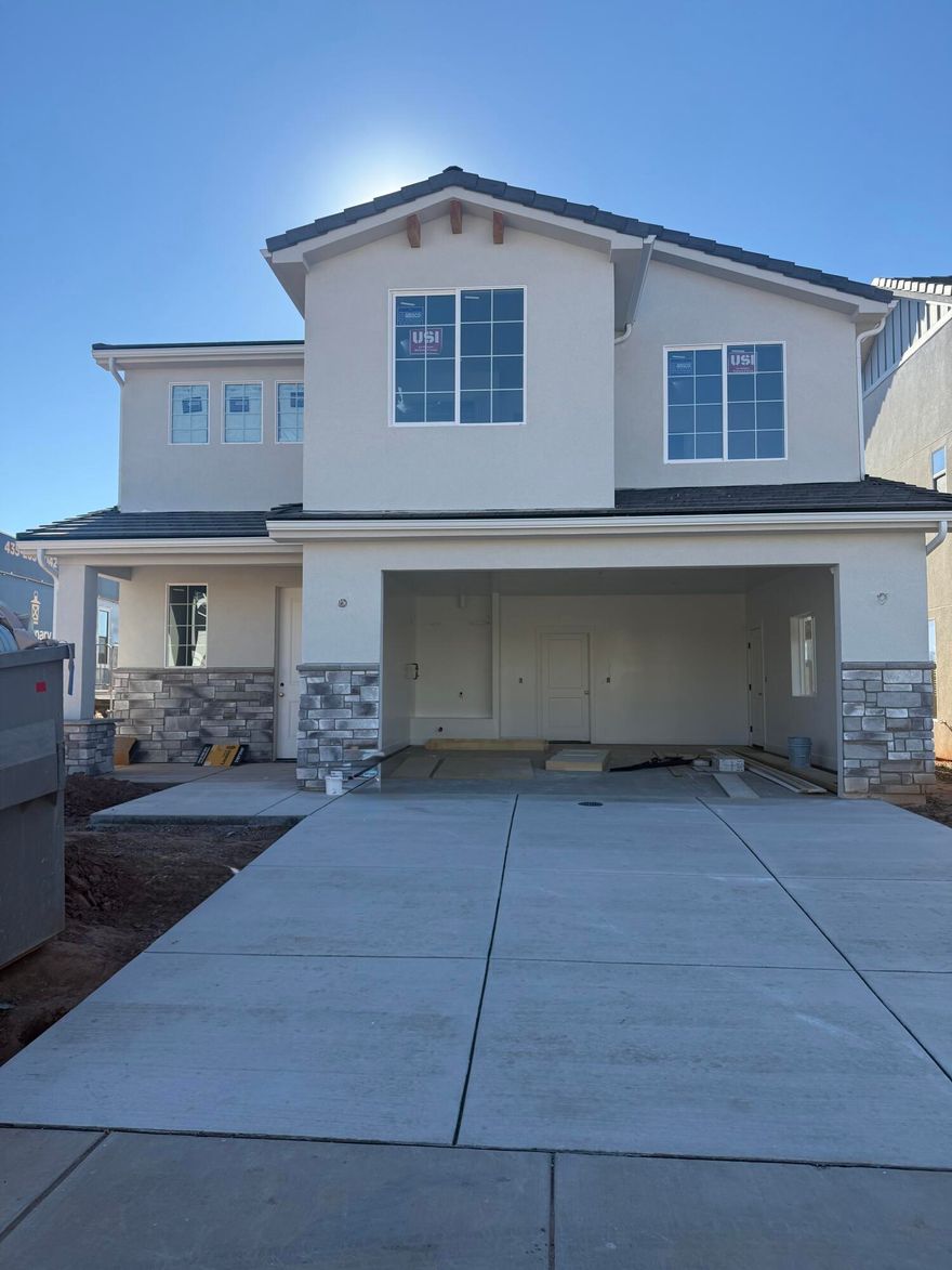 Discover your perfect oasis in this brand-new home, nestled in a delightful community adjacent to the exciting Zion Shores Surf Park and Southern Utah's breathtaking recreational areas. This thoughtfully designed residence seamlessly combines modern elegance with comfortable living, making it ideal for families and outdoor enthusiasts alike. The spacious home features large windows that flood the space with natural light. Step outside to enjoy your private backyard, perfect for barbecues or simply soaking in the stunning Southern Utah views. The community offers outstanding amenities and easy access to Warner Valley and Sand Hollow. Embrace the lifestyle you've always wanted while living in this charming home!