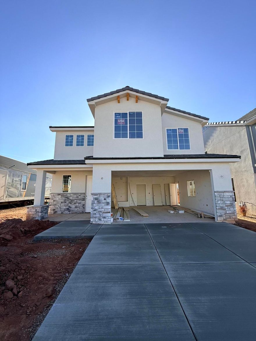 Discover your perfect oasis in this brand-new home, nestled in a delightful community adjacent to the exciting Zion Shores Surf Park and Southern Utah's breathtaking recreational areas. This thoughtfully designed residence seamlessly combines modern elegance with comfortable living, making it ideal for families and outdoor enthusiasts alike. The spacious home features large windows that flood the space with natural light. Step outside to enjoy your private backyard, perfect for barbecues or simply soaking in the stunning Southern Utah views. The community offers outstanding amenities and easy access to Warner Valley and Sand Hollow. Embrace the lifestyle you've always wanted while living in this charming home!