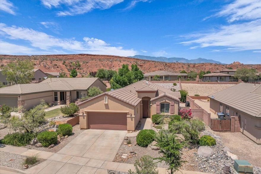 Lovely Coral Canyon home with mature landscaping, low HOAs and some of the best amenities in the valley! Newer HVAC system, garage door opener and stove. Enjoy sitting under the professionally installed awning w/ fans to enjoy those perfect evenings. This little gem is waiting for You to call HOME.