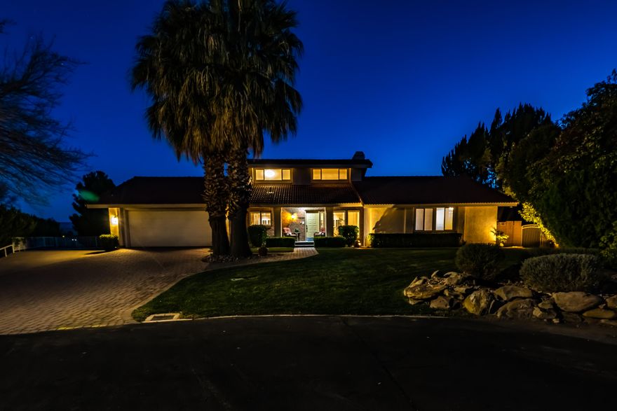 Bloomington Retreat with Pool, ADU & Expansive Living Spaces! Set on a .34-acre cul-de-sac lot in the Bloomington area adjacent to the Bloomington Golf Course, this spacious property offers exceptional indoor-outdoor living and remarkable flexibility. A cobblestone walkway leads to the classic brick exterior and welcoming entry. Inside, vaulted ceilings, gleaming oak hardwood floors, and a dramatic fireplace create a warm and inviting living space. Plantation shutters filter natural light and add timeless character throughout. The well-appointed kitchen features granite countertops, abundant cabinetry, a paneled refrigerator, cooktop, and double built-in ovens--ideal for both everyday living and entertaining. The main level includes the primary suite with ensuite bath, two additional bedrooms, and a versatile loft overlooking the living area--perfect for an office, reading lounge, or creative workspace. The fully finished basement expands the home with three additional bedrooms, two bathrooms, a large gathering space, flex room, patio access, and generous storage. A standout feature is the attached one-bedroom ADU with full kitchen and private entrance, offering excellent flexibility for guests, extended living arrangements, or rental opportunities. Outside, enjoy a private backyard retreat complete with pool, separate hot tub, and landscaped grounds with space for gardening and outdoor gatherings.