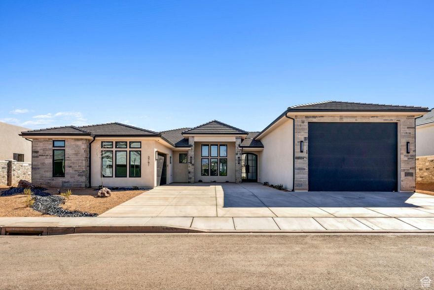 Special Offer: Secure a 4.99% fixed interest rate through our preferred lender with a full-price offer. This rate is subject to change based on current market conditionsDecorated Model. Hawkeye Point is close to EVERYTHING! Just minutes from Downtown St. George and Tuacahn entertainment to the west and Sand Hollow and the sand dunes to the east. perfectly located in the middle of it all. Whether it's hiking, biking, camping, water and off-road recreation, theater, shopping and dining or simply peaceful scenic walks. modern floor plans with RV garages are perfect for the on-the-go lifestyle. Our standards include insulated interior walls, upscale kitchens, open layouts, with ample room for entertaining . The RV Garage is 20 X 43 w/ 16x12 high door