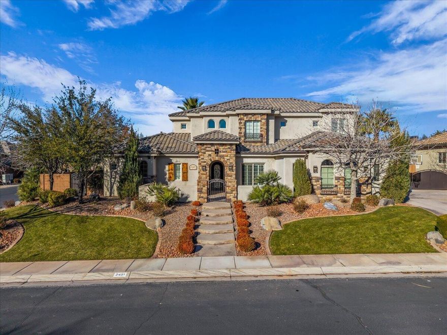 Welcome to 2451 Lagrasse Circle in the Villages at Little Valley in St George.

This quiet location is just steps away from the Fields at Little Valley with Pickleball, Turf Fields, Skatepark, Baseball/Softball, and multiple parks.

This timeless custom home includes a feature packed nearly 4,100 square foot layout, 5 bedrooms, 3.5 bathrooms, office, den, open great room, plus another upstairs family room!

Outside features your own private oasis with built in pool, towering palm trees, and newly installed turf for year round enjoyment.  The covered patio offers abundant room for patio and dining furniture and wraps around to the primary suite.

The split layout 3 car garage features over 1,000+ square feet of space along with additional gated sideyard space as well.

No HOA!