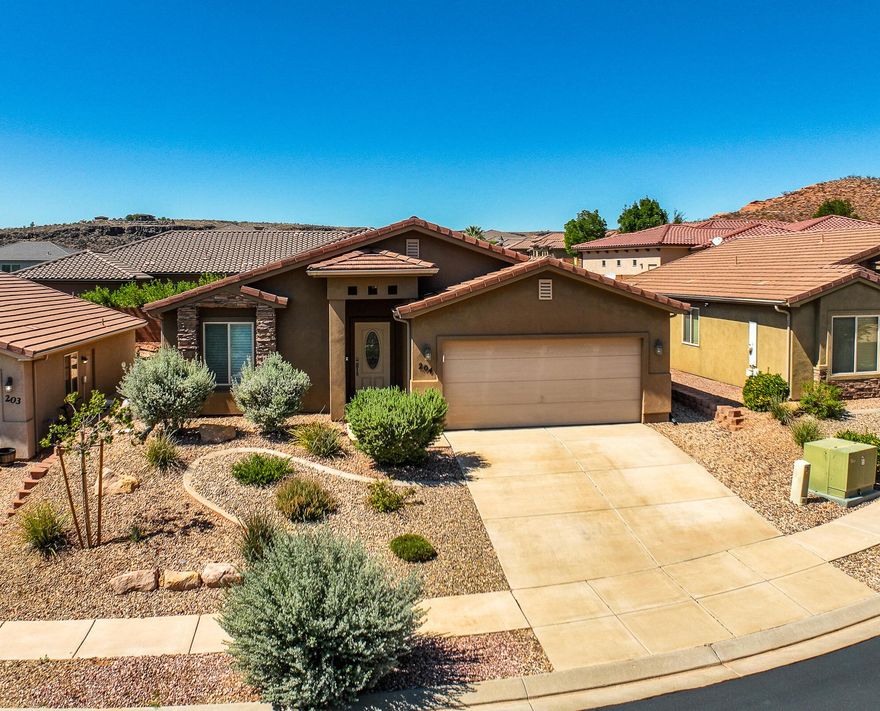 This beautifully maintained 2 bedroom, 2 bathroom home has been thoughtfully updated and lightly lived in as a second home. Recent improvements include fresh paint, new flooring, updated blinds, and even upgraded toilets for peace of mind. The water heater was replaced in 2022, adding to the home's move-in ready appeal.
The living room is a true standout, featuring a unique accent wall that creates a warm, inviting atmosphere you won't want to miss. Both bedrooms are comfortable and bright, while the open layout makes the home feel larger than expected.
Set in a quiet subdivision, this home offers the perfect balance of comfort and convenience— ideal as a primary residence, second home, or investment. Priced perfectly and ready for its next owner, this property won't last long