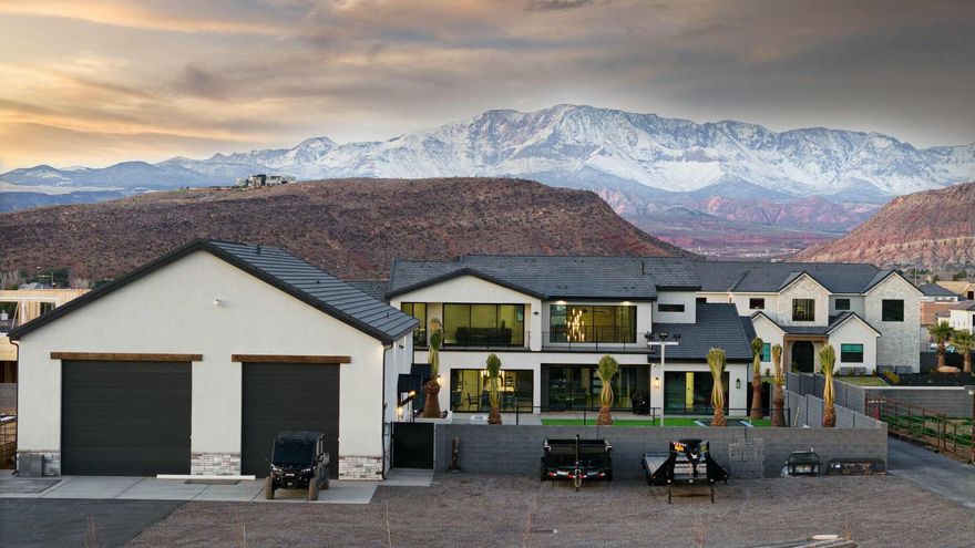 Discover a one-of-a-kind estate in Washington Fields, ideal for your dream homestead. Set on 2.29 acres with horse privileges, this custom home features ensuite bedrooms, walk-in closets, and high-end finishes. A 3,520 sq ft barndominium-style garage—heated, air-conditioned, and equipped with a bathroom, TV, and sink—offers versatile living and workspace but is not included in the home's finished living space, and can be converted into an apartment. Enjoy a roping arena, four stalls, two irrigated pastures, pool, pickleball court, and trampoline. The fields and arena can be transformed into a sports arena, batting cages, or anything you envision. No HOA—appraised at $4.16M.

3 more bedrooms and 2 baths can easily be added to this house. Sketches for additional bedrooms available.