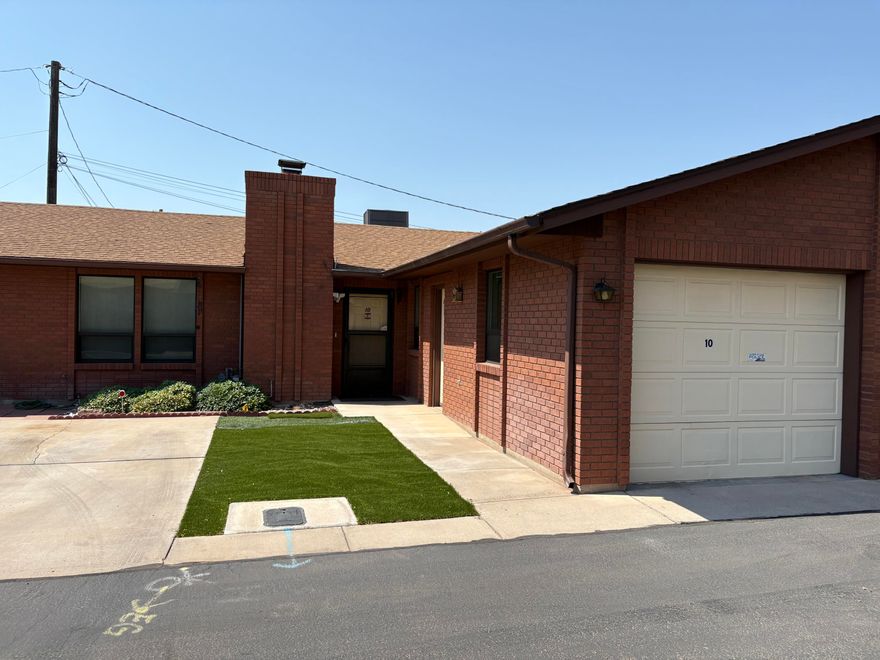 Well-maintained and beautifully upgraded all-brick townhome located just minutes from downtown St. George. This 3 bedroom, 2 bathroom home features a spacious, partially covered patio ideal for outdoor living and entertaining. The open floor plan includes a cozy gas fireplace, upgraded finishes throughout, and ample natural light.
Enjoy a prime location near Dixie High School, Utah Tech University, City Park, shopping, dining, and places of worship. Low HOA fee offers added value without sacrificing amenities. Perfect for full-time living, or a second home.