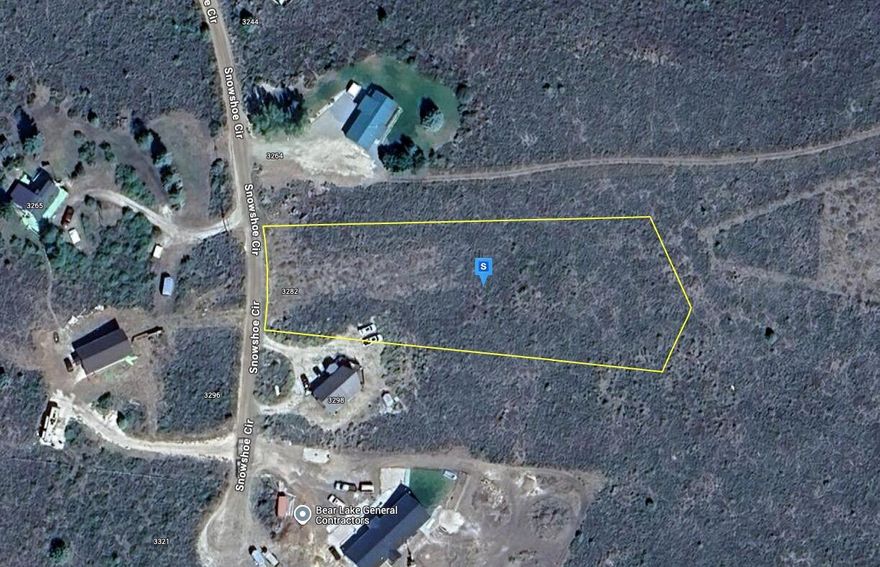 Located in the Sweetwater Park Subdivision, this spacious 2.1-acre lot sits on a private cul-de-sac with power and water available and septic required. Take in beautiful lake and mountain views while remaining close to outdoor recreation—Bear Lake Golf Course is 5 minutes away, the marina 10 minutes, and Beaver Mountain Ski Resort about 20 minutes. A roomy lot in a well-established neighborhood, perfect for building your dream cabin in a scenic and convenient location.