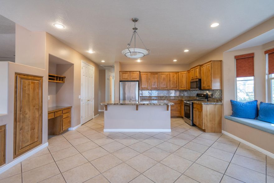 This lovely home is located in the vibrant Coral Canyon community and features a spacious, open floor plan. The primary bedroom is generously sized, and the living room offers a cozy spot to unwind. The 4th bedroom near the entrance can be a den if desired. Outside, you'll find a private fenced yard and a large covered patio. The community boasts fantastic amenities, including a clubhouse, indoor and outdoor pools, tennis and pickleball courts, plus a fitness center. Plus, it's just a short distance to the Coral Canyon Golf Course and plenty of other outdoor activities.