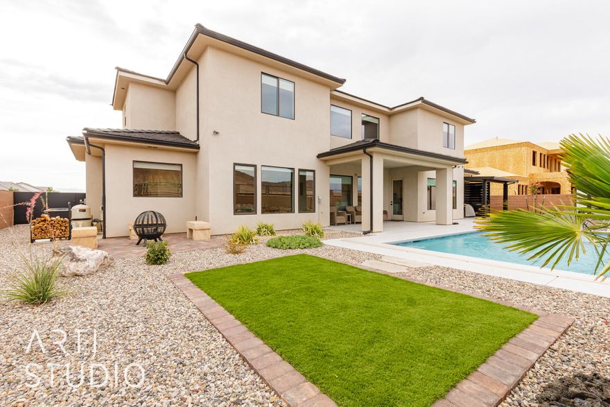 Immaculate modern home in Iron Horse  backing up to Desert Habitat Reserve. This private backyard is an oasis with stunning mountain views! Features include a pool, outdoor BBQ area, Everlights and spacious RV GARAGE with additional parking. Upgraded throughout with stylish finishes, this home offers both luxury and comfort. Enjoy peaceful evenings in your beautifully designed outdoor space — perfect for entertaining or relaxing. A rare find in a highly sought-after community!