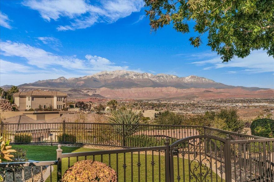 This immaculate and freshly remodeled home features unobstructed view of Pine Valley Mountain and the Red Cliffs of Southern Utah. Stone Cliff is one of southern Utah's premier gated communities. The lifestyle includes two clubhouses, two pools, spa, fitness center, 6 pickleball courts, tennis and bocce ball.

This light and bright single level home (no steps or stairs) includes all en suite bedrooms plus an office and an oversized den, fireplace, and solid wood doors. Also featured are two outdoor patio areas, low maintenance landscaping, and an oversized 3-car garage.