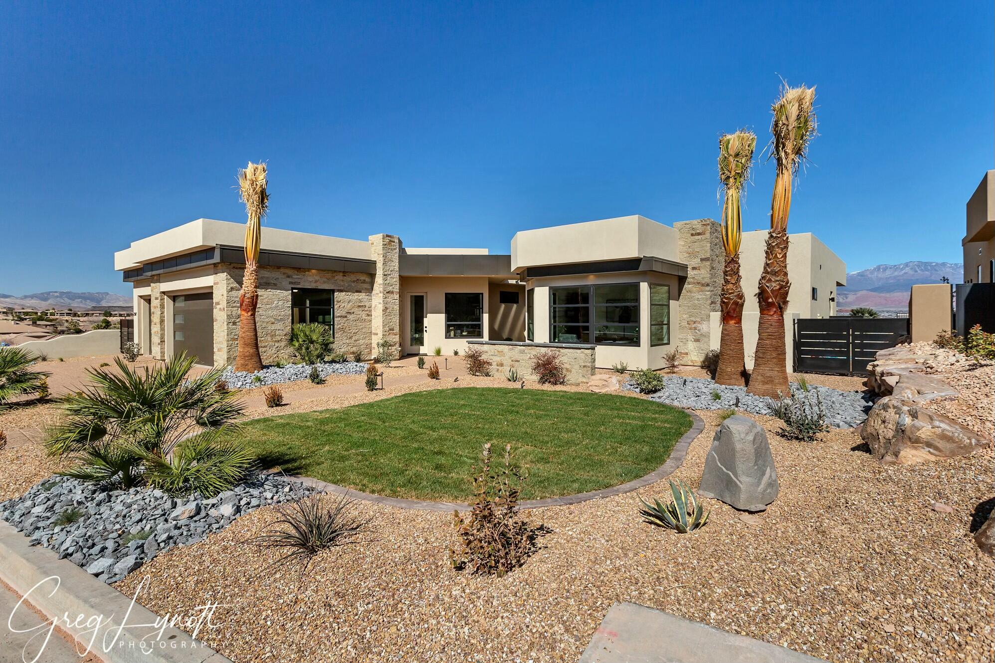 This home located in the premier gated community ''Stone Cliff''. Sweeping views of the city of St George & Pine Valley Mountain.  2020 Parade of Homes built by Circle A.  This home is like new, low maintenance yard & a spool that heats up very fast.  Dixie Power for low utilities. Stone Cliff is in the heart of St George with great access to everything.  Gated, 24/7 Security, new fitness gym, indoor and outdoor pools, tennis and pickleball courts and event center.  Furnishings & Decoration package available for purchase.