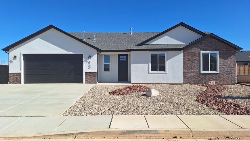 Introducing The Ivy, an affordable and functional single-family home featuring 3 bedrooms, 2 bathrooms, and a two-car garage. The open-concept design seamlessly connects the kitchen, dining, and living areas, perfect for everyday living and entertaining. The master bedroom offers a private retreat with an ensuite bathroom, while two additional bedrooms provide versatility. Outside, the home features block walls, metal gates, and a low-maintenance dryscape front yard. Personalize your home with a variety of selections for both interior and exterior finishes. Choose The Ivy today and create the perfect home for you and your family!