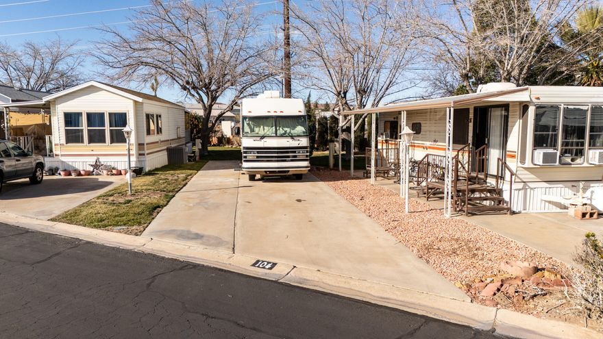 Enjoy easy living in this 0.08-acre RV lot located in a desirable 55+ active community! This spacious concrete pad is ideal for your motorhome with room to relax outdoors. Adjacent to this property, your just steps away from the Virgin River walking, biking, and running trail, and across from Millcreek Park. Surrounded by beautiful red rock scenery, mature landscaping, and mountain views, this location offers peace, convenience, and an active lifestyle. Close to shopping, dining, medical services, and golf, this lot is perfect for full-time living or a seasonal retreat in sunny Southern Utah.   $130 per month HOA fees cover road care, yard care, common area maintenance, water, garbage, and clubhouse access to the indoor pool, spa, fitness area, game room, & coin operated laundry room. Each lot is stubbed for high speed fiber at discounted rate of $45 but is not included in the HOA fee. Lot must be owned for one year prior to renting. NO short term rentals. Each lot owns a private shed for extra storage.