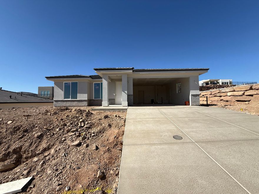 Welcome to your desert sanctuary located in beautiful Salarno Hills of Divario. Meet our Cliffrose plan, showcasing an open concept layout with a flex room off the entry way creating a perfect home office. Located in one of Southern Utah's most sought after communities, you'll enjoy easy access to hiking, biking trails, golf courses and downtown amenities all while enjoying the peace and privacy of your own desert oasis. Home is scheduled to be complete and move-in ready in June. All Visionary Homes are built with 2x6 framing and R-50/R-19 insulation for extra heat-cooling efficiency. Call Shannon to schedule your private showing and ASK ABOUT OUR PREFERRED LENDER INCENTIVE.
