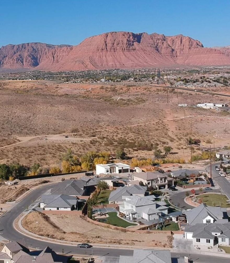 Walkout basement lot in the Hills at Santa Clara. North/South orientation. Amazing views of the Ivins Red Mountain and Snow Canyon State Park. RV Garage or RV parking option. lot is 167 Feet wide.