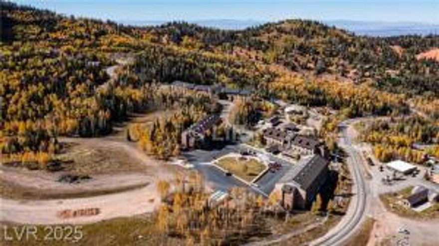 Tucked amid the alpine beauty of Brian Head, Utah, Cedar Breaks Lodge offers a tranquil mountain escape beside the Navajo Ski Trails. From this privately owned studio, sweeping views of pine forests & rugged peaks invite both adventure & rest. The space is warm & inviting, featuring a gas fireplace & a kitchenette with a microwave—perfect for easy meals after a day outdoors—& a jetted tub in the full bath for pure relaxation. Resort amenities include an indoor pool, Jacuzzi, sauna, fitness center, elevators, & underground parking for convenience. Whether carving slopes in winter or exploring Bryce Canyon & Zion in summer, every season offers discovery. End the day with BBQs, playground fun, or seasonal games under the stars. Décor, highlighted by Rock Photographer Carl Dunn's photos.