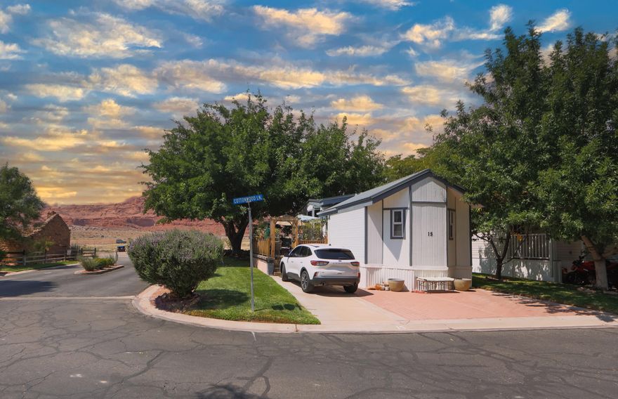 Beautifully updated home in Hurricane with one of the best decks in the community—enjoy sweeping views of the Red Cliffs. Inside you'll find fresh paint, new carpet, upgraded flooring, quartz countertops, updated cabinetry, lighting, and all major appliances along with a new HVAC system. The yard offers a peach tree for summer harvests. Just minutes from Quail Lake and endless outdoor adventure, this home blends comfort, upgrades, and location in one inviting package.