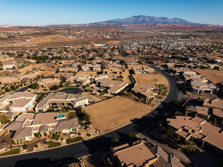 Exceptional view lot in Stone Cliff. This is a wide rectangular, single level homesite with stunning western and northern views. Surrounded by fully completed luxury homes, this lot provides the confidence of knowing exactly what your views and surroundings will be—no future construction surprises. Enjoy the privacy, prestige, and tranquility Stone Cliff is known for, while being part of a beautifully established neighborhood.
