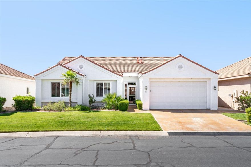 2 Hour Notice for all showings:  Welcome home to comfort, charm, and easy living. This beautifully maintained 3 bedroom, 2 bath home offers 1,796 sq. ft. of thoughtfully designed living space, including a flexible third bedroom ideal for a home office, hobby room, or guest space. Spacious rooms and an inviting floorplan create a comfortable flow throughout. The updated kitchen features warm cabinetry, granite countertops, abundant storage, and a large island perfect for gathering and entertaining. Plantation shutters throughout add timeless style and privacy. Relax in the cozy living room with custom built-ins and fireplace, or unwind in the screened patio overlooking a peaceful pond and water feature. Complete with a walk-in tub and separate walk-in shower.