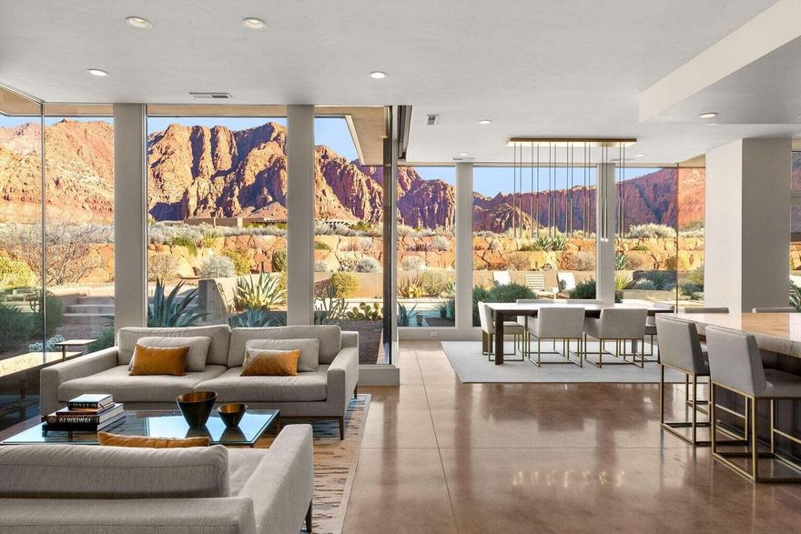 Set on over two private acres in the heart of Kayenta, this extraordinary residence is a true sanctuary where refined design meets the raw beauty of the desert landscape. Thoughtfully positioned to capture nearly three hundred sixty degree views, the home is wrapped in glass, light, and scenery, allowing the outdoors to become an ever present part of daily living.

From the moment you enter, the architecture and flow invite both serenity and connection. Two luxurious primary suites offer private retreats, while a designer chef's kitchen anchors the home with Brazilian and Neolith granite, top of the line Miele appliances, and a Sub Zero refrigerator with integrated air purification. Expansive mitered glass windows dissolve the boundary between inside and out, filling the home with natural light and framing the iconic red rock surroundings from nearly every room.

The residence is fully integrated as a smart home and features an eight zoned radiant floor heating system, providing effortless comfort year round. Custom walnut cabinetry and doors, paired with Restoration Hardware lighting and furnishings, elevate each space with warmth and timeless sophistication. A thoughtfully designed flex room adds versatility, adapting seamlessly to your lifestyle whether for work, wellness, or creative pursuits.

Outside, privacy and luxury continue. A heated saltwater pool and spa create a resort like setting, complete with a dedicated pool equipment house and a secluded outdoor shower. Multiple outdoor living spaces invite you to gather, unwind, or simply take in the stillness and beauty of Kayenta. A pergola with additional storage, a three car garage with extra depth and height, and fully xeriscaped grounds ensure both function and ease of living.

This is more than a home. It is a place of peace, presence, and elevated living, designed for those who value privacy, craftsmanship, and breathtaking views in one of Southern Utah's most inspiring communities.