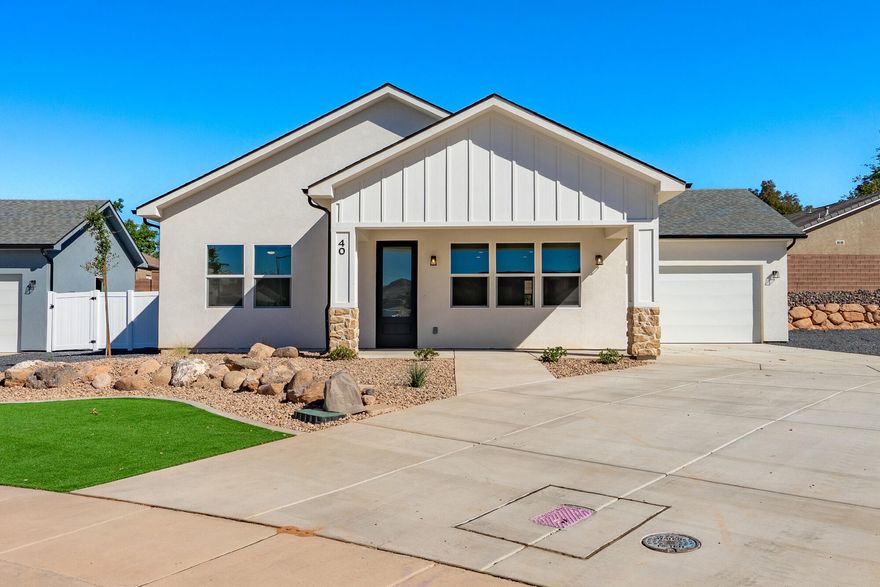 Welcome to this charming, brand-new 3 bed/2bath home located in the heart of La Verkin. All on 1 level! 
Epoxied garage floor, artificial turf added for low maintenance living, and walk in shower located in primary bathroom. Nestled in a peaceful and quiet neighborhood and located just a stone's throw away from the park, this home offers comfort and convenience for today's lifestyle!