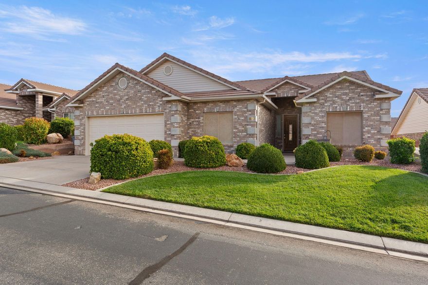 Welcome to your dream home, perfectly located in one of Southern Utah's most sought-after areas! Enjoy a desirable east-facing backyard in a quiet, well-kept neighborhood offering easy, low-maintenance living. This home features separate living areas and a primary suite with a double vanity, separate tub and shower, and a walk-in closet. Additional highlights include a workshop, extra garage storage, and an indoor storage room, along with newer heating, air conditioning, and water heater. Refrigerator, washer, dryer, and water softener are all included. HOA includes front and back yard maintenance. Move-in ready and conveniently located near I-15, shopping, dining, and recreation — this home has everything you need for comfortable Southern Utah living!