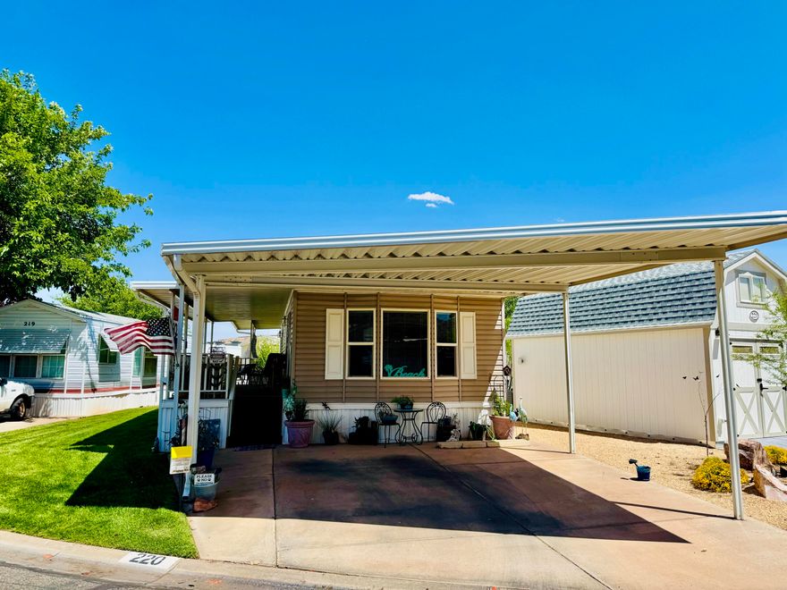 Located in Worldwide Sun Resort (#220), this well-maintained 2-bedroom, 1-bath home features beautiful mountain views from the covered deck, newer Whirlpool appliances, and fresh flooring throughout. Enjoy the rare benefit of owning your own lot in a vibrant 55+ community offering an indoor pool, hot tub, library, billiards room, craft and woodworking spaces, and a private dog park. HOA includes landscaping, water, and access to community amenities. Easy, low-maintenance living—schedule your showing today! Buyer to verify all information.