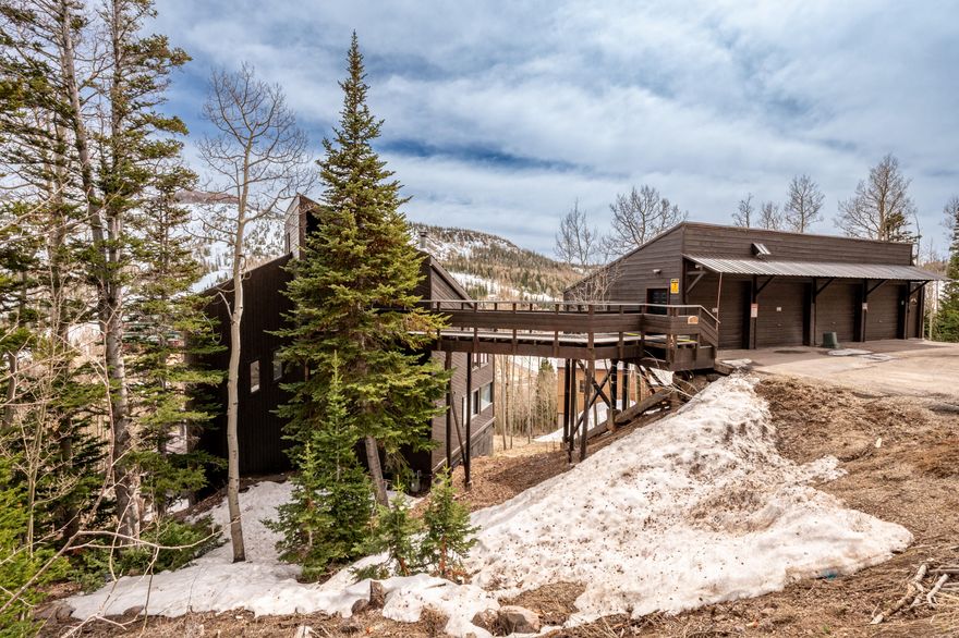 Located in Brian Head, this 3,345 sq ft mountain home offers a distinctive setting with year-round access and expansive, unobstructed views. Designed to take full advantage of its surroundings, the home features several outdoor decks that provide multiple spaces to gather, unwind, and enjoy the scenery from different angles. Inside, the home has been expanded and updated over time. The floor plan includes four separate sleeping areas, including a primary suite with its own fireplace and private bathroom with a Jacuzzi tub. Additional highlights include a secondary bedroom with a fireplace, a main living area with a gas fireplace, and an upper-level loft or office space. The kitchen is equipped with modern appliances and connects easily to the main living areas, making the space practical for both everyday use and entertaining. The lower level adds flexibility with a second family or media room, bunk space, a laundry area, and additional storage.

A standout feature of the home is the enclosed solarium, which includes a hot tub, sauna, and space for a small workout area--all oriented to capture the surrounding views. Recent upgrades include refreshed finishes, updated lighting, refinished hardwood floors, and improved safety systems. The home also includes two water heaters, adding convenience for larger groups.


Set along the mountainside and accessed by a 50-foot bridge, the property looks out over Brian Head Resort, Bristlecone Pond, and the valley below, all while being just a short drive from the main ski areas. This property offers a well-rounded mountain retreat in a highly scenic location.

Square footage breakdown.
Level 1; Entrance office: 350sqft.
Level 2; Living Room and stairs: 784sqft
Level 3; Bedrooms and stairs: 784sqft
Level 4; Basement: 784sqft
Level 5; Jacuzzi room: 410sqft + Bedroom/storage: 233sqft