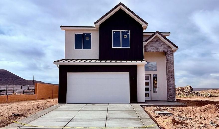 S&S Homes at Paraiso! Conveniently located in Hurricane where SR9 meets SR7/Southern Parkway. This home has a 2 story entry. Scheduled colors and finishes include painted cabinets throughout, quartz countertops throughtout, kitchen backsplash, tiled tubs and showers, primary shower tile to ceiling with frameless glass door, primary closet with stacked washer dryer hookups, second floor laundry room, black plumbing fixtures, front and backyard landscaping too! Call or text for additional details.