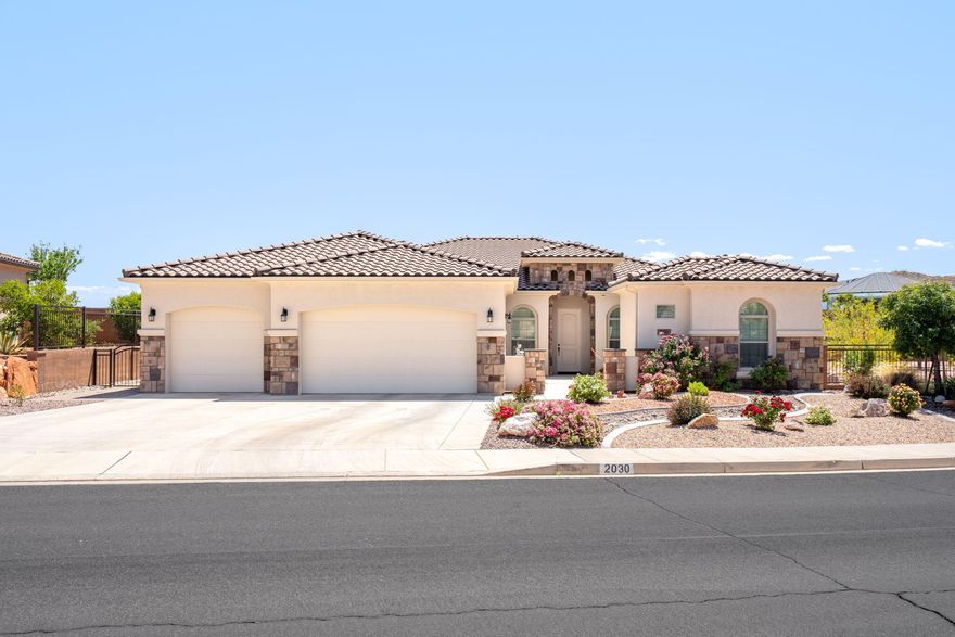Welcome home to this beautifully maintained single-owner home situated on a spacious corner lot, offering breathtaking unobstructed mountain, desert, and sunset views from its elevated setting above neighboring homes. The inviting foyer flows seamlessly into the open great room, where a cozy gas fireplace creates the perfect atmosphere for relaxing or entertaining. Designed for both comfort and functionality, the attached casita features its own private entrance, split-type heating and cooling system, a large bedroom spacious enough for a California King bed, plus a microwave, mini-fridge, sink, and beautiful cabinetry, perfect for guests or generational living. The spacious primary suite offers a true retreat with a multi-jetted jacuzzi tub, en-suite bathroom, and an impressive walk-in closet. Sliding glass doors lead to an incredible 70-foot patio with multiple seating and entertaining spaces, perfectly positioned to capture the soothing sunsets and stunning desert scenery. The side yard is accented with mature fruit and shade trees, while the meticulously landscaped grounds provide beauty with minimal maintenance. Additional upgrades include soft-close kitchen cabinets and drawers, epoxy garage floors, ceiling-mounted storage racks, an EV charger, and the convenience of easy single-level living throughout. Buyer to verify all information, deemed reliable, however buyer to verify all info including utilities, rental restrictions, and HOA information if applicable.