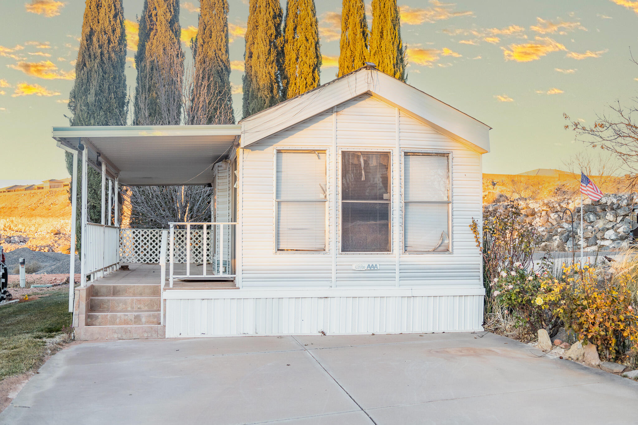 Investor special! This mobile home sits on an owned lot in a clean, well-maintained neighborhood. Enjoy stunning views from the deck and the potential to make this property truly shine. A fantastic opportunity for your next project!