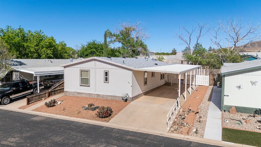 Welcome to the desirable Lava Bluff Community, a welcoming 55+ community in Hurricane designed for comfort, convenience, and easy living. Situated on its own lot, this lovingly maintained home offers the added benefit of land ownership along with a low-maintenance lifestyle. Ideally located near the clubhouse and mailbox, the home has had only one owner who has taken exceptional pride in caring for it over the years. Recent updates include a new roof and new carpet in the living room, giving the home a fresh, move-in-ready feel. Outside, enjoy easy-care landscaping so you can spend less time on upkeep and more time enjoying the lifestyle and amenities the community has to offer.