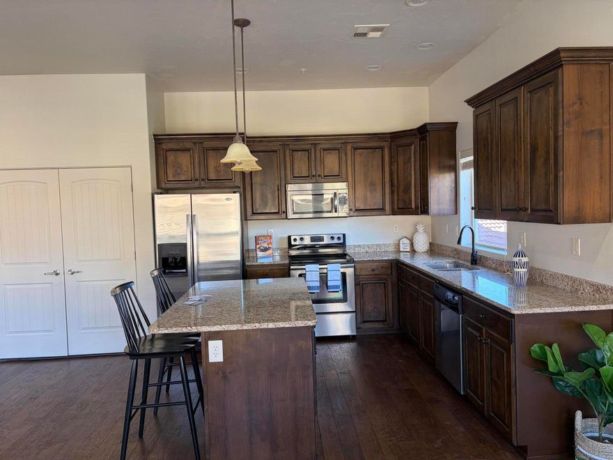 $10,000 SELLER CONCESSIONS!! Use for buying the interest rate down, pay HOA fees, closing costs, etc. Pine Valley views from primary bedroom and kitchen! Nicely kept, freshly painted condo in the coveted Bella Terrazza community in Sunbrook! Two comfortable bedrooms, large great room, fireplace, and nice, open kitchen. You will love the community with pool, hot tub, community center, fitness center. HOA includes exterior maintenance and insurance, sewer, water, garbage, and full yard maintenance. Come and see it today! OPEN HOUSE SATURDAY 4/25. 10:00-2:00!!