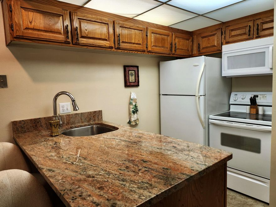 Welcome to your perfect investment opportunity and desert retreat in the highly sought-after Sports Village community of St. George.  It is a fully furnished 1 bedroom, 1 bathroom turnkey condo and ready for immediate use as a nightly rental, second home or full-time residence.
The condo features an open living area, a fully equipped kitchen, and a private deck overlooking a park like setting and large water fountain. The spacious bedroom and bathroom provide a relaxing retreat after a day of adventure.  It also includes a 1-car garage with new garage door. 
Sports Village is one of the few communities in St. George approved for nightly rentals, making this property an excellent income-producing opportunity. The resort-style amenities are unmatched, including pools, hot tubs, tennis and pickle ball courts, racquetball courts, fitness centers, clubhouse, mini golf, playground, and beautifully maintained grounds. 

Located in the desirable Green Valley area, you're just minutes from world-class hiking and biking, Snow Canyon State Park, Tuacahn Amphitheatre, and a short drive to Zion National Park. 
Whether you are looking for a low-maintenance investment property or a personal get away, this turnkey condo offers flexibility, strong rental potential, and resort-style living.