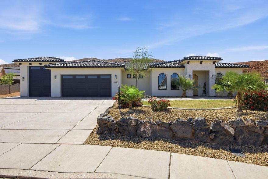 Stunning home in Scenic Sunrise at the end of a cul-de-sac with views, RV garage + parking, and no HOA! This thoughtfully designed property features a bright open layout with luxury vinyl plank flooring, white oak cabinetry, quartzite countertops, and a custom Venetian plaster hood as a true kitchen centerpiece. The kitchen offers a spacious walk-in pantry, designated dining area that leads to the back patio and large island for entertainment. Versatile front casita/salon space with its own entrance offers endless possibilities. Such as, home office, guest suite, or business use. The primary en-suite is complimented by a walk-in closet, walk-in shower, dual sinks and separate soaking tub. Spacious living areas flow seamlessly to the covered patio and backyard, with a retaining wall already in place and seller offering to coat the patio for the buyer if desired.  Located in a welcoming neighborhood with community events and great neighbors, just minutes from shopping, dining, and walking distance to Horizon Elementary. Clean, modern, and move-in ready!