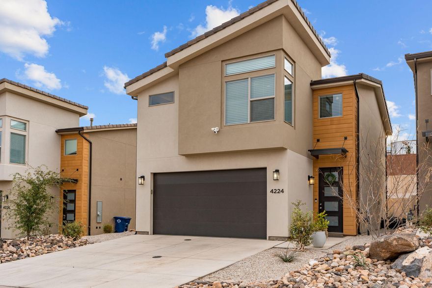 Cute 4-bedroom, 2.5-bath stand-alone townhome in a prime location close to the airport and easy access to I-15. This low-maintenance home offers a functional layout with comfortable living spaces and a quaint back porch—perfect for relaxing outside. Enjoy being just minutes from scenic biking trails, hiking paths, and endless outdoor recreation. Whether you're looking for a primary residence, second home, or investment opportunity, this property offers value, convenience, and lifestyle in one package.