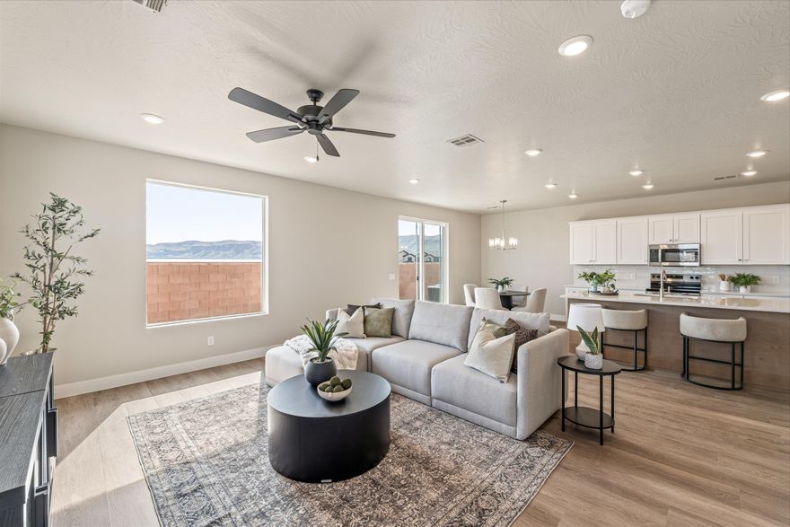 End Unit & More Backyard! Priced at just $184 per square foot - this property stands out as the best value on the market. It's time to get your tape measure out, because we haven't only added space inside the house. Our 23' wide and 24' deep garage with an 18' wide and 8' tall door is noticeably larger than the competition.

Inside, the open-concept floor plan creates a seamless flow ideal for entertaining or everyday living, while generously sized bedrooms provide flexibility for family, guests, or a home office. High-end finishes shine throughout, including granite countertops, engineered wood flooring, and beautifully tiled showers and baths that blend style with lasting durability.

Located directly across the street from a neighborhood park and pickleball court, you'll enjoy instant access to outdoor recreation right outside your front door. Perfectly positioned for adventure and convenience, this home is also just minutes from world-renowned Zion National Park, along with nearby shopping, dining, and schools -- offering the very best of Southern Utah living.

*Ask About Our Lender Incentive*.