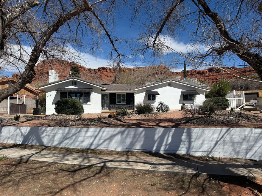 Amazing, fully remodeled downtown St. George property that has a full ADU on the property that can also be used legally for select businesses.  ( See attached Docs).  Main home has 3 bedrooms with 2 bathrooms. ADU has large family room,bedroom,spacious kitchen, full bathroom, stacking washer/dryer covered carport and large storage room.