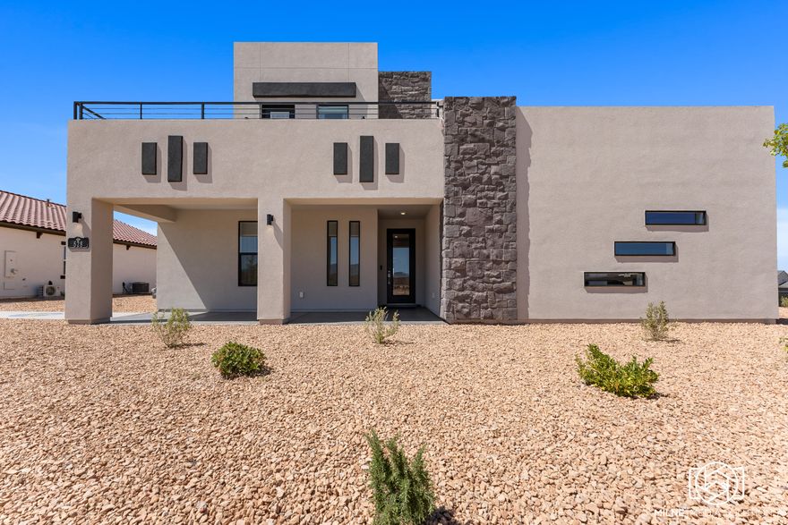 LIMITED INVENTORY + BUILDER INCENTIVES! ASK ABOUT UP TO $23,000 TOWARD CLOSING COSTS OR RATE BUYDOWN WITH SELLER & PREFERRED LENDER. This beautiful Model Home features the Crimson DM floor plan, thoughtfully designed and built by Carefree Homes-Southern Utah's trusted builder. Carefree delivers service that exceeds our home buyers expectations before, during and after the sale! Conveniently located near major highways and just minutes from exciting new commercial developments, this home is perfect for both work and leisure. Highlights include durable 2x6 construction, stylish 2'' faux wood blinds, epoxy-coated garage floors, a fully landscaped yard with turf, quartz/granite countertops, and soft close drawers. All info to be verified by buyer and buyers agent. Nestled within a vibrant and growing community, you'll enjoy a wealth of amenities right at your doorstep, including a state-of-the-art lagoon and all year long heated pool with several pickleball courts, perfect for outdoor fun and relaxation with family, friends and neighbors. Call today for a showing or for more information about Southern Utah's unique community, Desert Color.