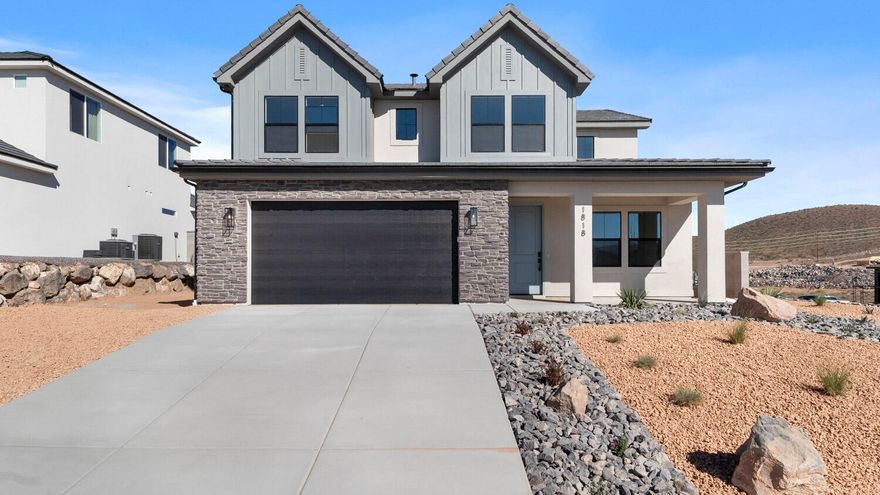 **MOVE-IN READY** Discover your dream home at Fire Rock, a stunning new D.R Horton community in Hurricane, UT! Explore the ''Slickrock'' floorplan featuring boosting upgrades and the best part? NO HOA. This inviting two-story home sits on a corner lot and offers a spacious 5 bedrooms, an office, 3.5 bathrooms, and a 2-car garage with an added toy garage. Perfect space for a growing family and plenty of room for toys. Ask me about our generous home warranty & special financing when using our in-house lender DHI Mortgage. Improving quality of life here with its prime location, Fire Rock is truly a gem. Don't miss out on the opportunity to make it your own.