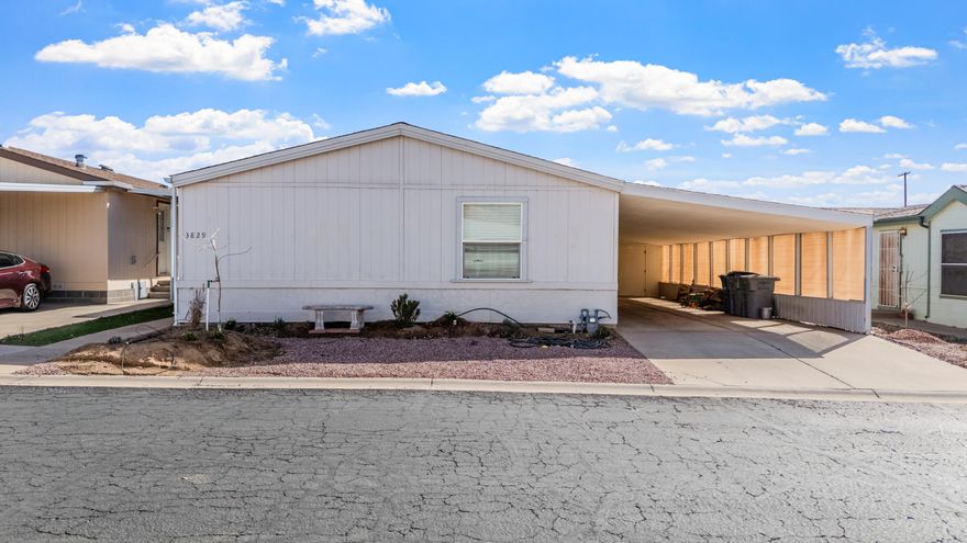 Located in the desirable Lava Bluff 55+ community, this thoughtfully remodeled 1,612 sq ft home offers upgraded construction, modern finishes, and a highly functional split-bedroom layout. Built with 2x6 exterior wall construction, upgraded insulation, and .625'' hospital-grade drywall, the home provides improved structural strength, sound reduction, and energy efficiency compared to typical 2x4 construction found in many homes in the community. The open kitchen and great room create a comfortable main living space, while the private primary suite sits on one end of the home with two additional bedrooms and a full bath on the opposite side for ideal guest privacy. Recent updates include Luxury Vinyl Plank flooring throughout, new kitchen cabinetry, fresh interior paint, and updated lighting. The kitchen features custom concrete countertops and a striking 36'' concrete farmhouse sink, while bathrooms include custom concrete countertops with integral sinks. Outside, enjoy a spacious 16' x 54' semi-enclosed carport and new landscaping with apple and peach trees. Conveniently located near St. George, Quail Creek, Sand Hollow, and Zion National Park.