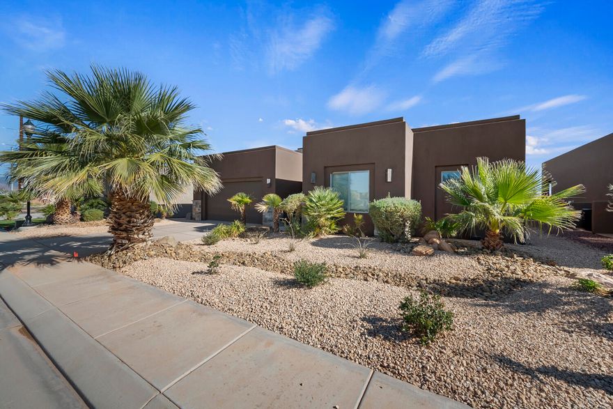 Conveniently located near all the beauty & adventure Southern Utah has to offer, this fully furnished, turnkey 4-bed, 3-bath home is truly ready to enjoy. The spacious floor plan features travertine throughout, creating an inviting space for hosting family and friends. Set on 0.16 acres and backing open space with beautiful views, the home has been refreshed with updated exterior paint and a desert scape front yard, offering a clean and modern feel. You'll also love the access to Sand Hollow's incredible amenities. Championship golf and dining, three community pools, 2 hot tubs, a fitness center, pickleball, the sand dunes, and the reservoir just minutes away. There's no shortage of activities. Built in 2016 with a with a 2 car garage, this low-maintenance home is a must see.