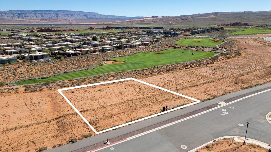 With over half an acre—This premium homesite offers the perfect canvas to build your dream home or vacation retreat, surrounded by panoramic views of Red Rock Cliffs, Zion NP, Mollie's Nipple and located on Hole # 17. Located within one of Southern Utah's most sought-after resort communities, this lot provides direct access to championship golf, off-road trails, and year-round recreation—all while maintaining a private, upscale residential setting. Whether you're envisioning a modern desert escape, a custom home with a toy garage for your adventure gear, or corporate Retreat, The Estates offers flexibility and value that are unmatched. With ample space for a pool, Toy/Boat garage, and outdoor entertaining, this lot is perfectly suited to embrace the Southern Utah lifestyle... where world-class design and luxury meets the adventure and natural beauty of Southern Utah. Minutes from Sand Hollow Reservoir, Zion National Park, and endless outdoor recreation, this is more than just a place to liveit's a place to experience your legacy.
Seller has conceptual floor plans and renderings that can be included in the cost of the lot.