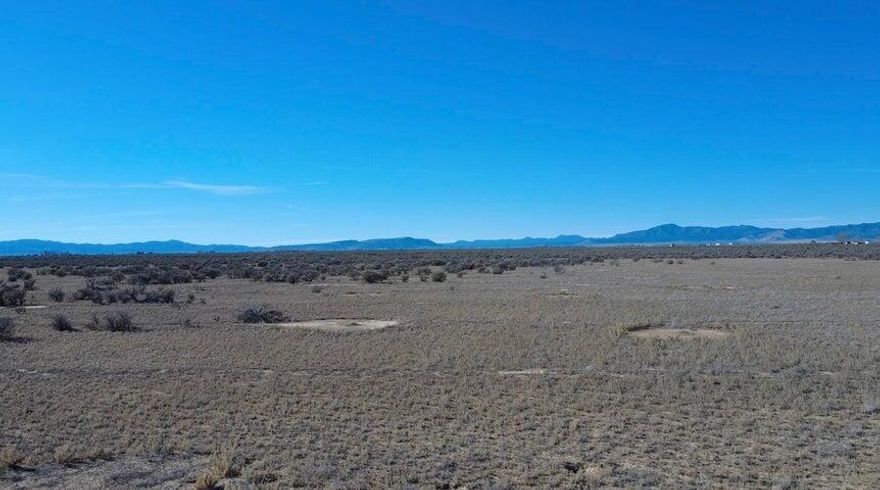 Now Available 5.10 Acre parcel in Beryl Utah with 1 Acre Feet of Water Right #71-5189 (Priority Date is 04/12/1944). Conex container is included in the sale. Trailers/vehicles can be included or removed based on the buyers preference. This 5 acre parcel is flat and usable with year round access. Quiet and remote. Drill a well, build your dream home, barndominium, or cabin. This would be the perfect spot for a family/friend vacation retreat spot. Bring your RV's, Trailers and campers, toys and getaway from the city life. Only 50 minutes to St. George or Cedar City. Only a couple of hours to Las Vegas. Nearby community of Enterprise (20 minutes) has gas, grocery, hardware, restaurant, doctor, dentist, and other amenities for convenience. Dixie Power nearby.