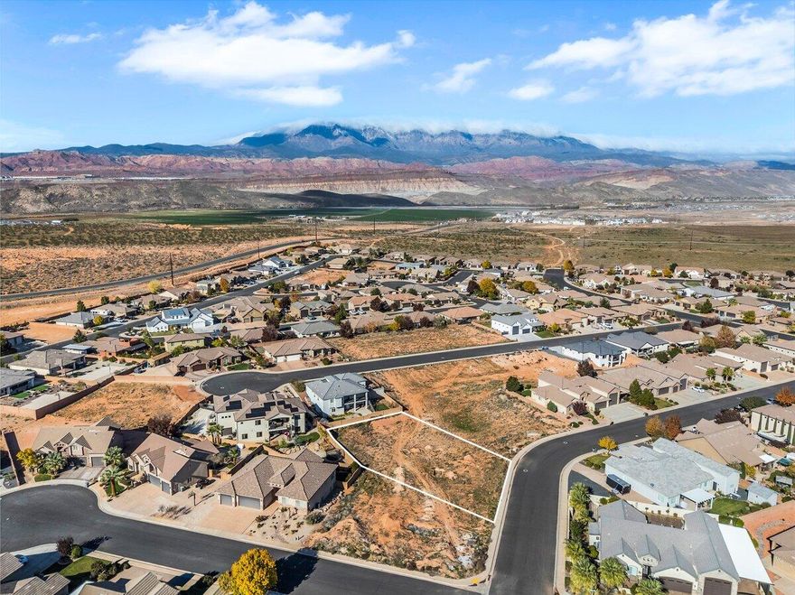 Build your dream home on this extremely rare, oversized lot in the coveted Dixie Springs community, where endless adventure and breathtaking scenery surround you. Connected Lots #168 (0.3 acre) and #170 (0.3 acre) are also available for sale! This build-ready property offers stunning mountain views, no HOA, and utilities already at the lot, making it the perfect canvas for your custom home. Just minutes from Sand Hollow Reservoir, Sand Mountain dunes, and Dixie Springs Park, you'll enjoy year-round access to boating, off-roading, hiking, and pickleball. With direct side-by-side access from your own garage to a network of world-class trails, outdoor fun is always within reach. Plus, you're only a short drive from Zion National Park, top-rated golf courses, and iconic red rock landscapes, offering a lifestyle that blends recreation, convenience, and natural beauty all in one. Buyer to verify all information, deemed reliable, however buyer to verify all info including utilities, rental restrictions, and HOA information if applicable.