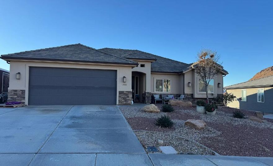 Located in a desirable neighborhood with beautiful city views, this spacious 6-bedroom, 4-bathroom home offers exceptional space and amenities.

The home features two full kitchens, two laundry rooms, and a walkout basement with a private entrance--perfect for extended living or added flexibility. Enjoy a fully fenced, large backyard complete with a separate fenced chicken coop area, basketball court, sand pit, paved patio, and a mature apricot tree ready for harvest just as summer begins.

Additional highlights include abundant parking and storage, a theater room, and a large 18' x 30' detached garage in the backyard equipped with 220-amp service and lighting. Two 20-foot storage containers are also located on-site for extra storage needs.

Available April 1. One-year lease required.  No cats.