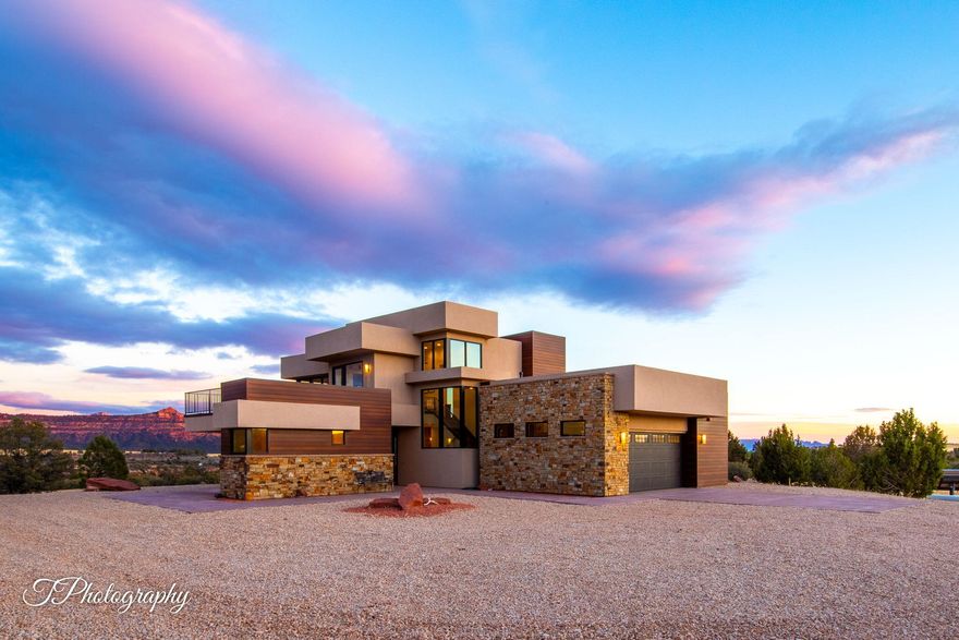 I am speechless—this is one of the most amazing properties in my 30+ years. A once-in-a-lifetime turnkey home with breathtaking views of Kolob Cliffs and Zion National Park, just 5 miles away. Sitting on 150 acres of pristine land, with potential for two additional 2-acre lots (water & septic in place). Total privacy—no homes in sight, fenced on 3 sides with Gorge/BLM on the other. Only 25 miles from Hurricane with full services. Fully self-contained: private spring with 45,000-gallon storage, 1,000-gallon propane tank, KOHLER backup generator, Mitsubishi Mini Splits, Smart Central Heating, solar panels, satellite internet, and a large stove heating the home. Side-by-side negotiable. Appointment requires verifiable funds.