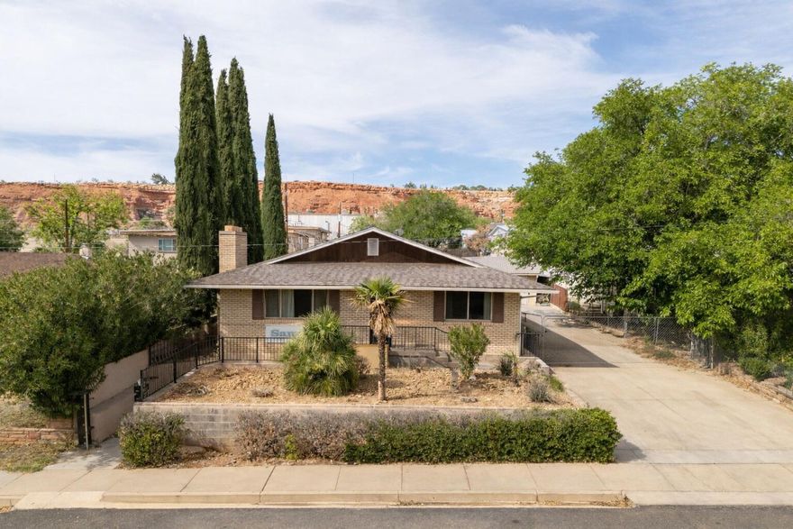 Investor's dream in a prime downtown location near the college! This 6 bed, 5 bath property is within walking distance to everything--restaurants, shopping, parks, schools, and entertainment. Includes a detached casita and basement apartment, offering multiple income streams. Mature landscaping and ample parking add to the appeal. Strong rental potential in a highly desirable area!