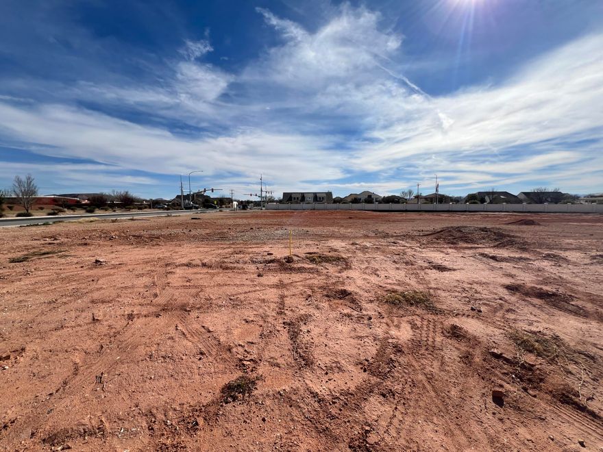 Large luxury corner view lot in Sacred Court subdivision. Beautiful views in all directions close to schools, shopping, restaurants and recreation. Bring your own builder.